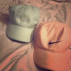 2 Nike hats